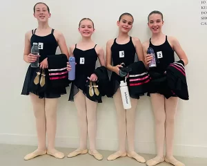 Royal Academy of Dance Exam Success 2025 - 4 ballet dancers in a group